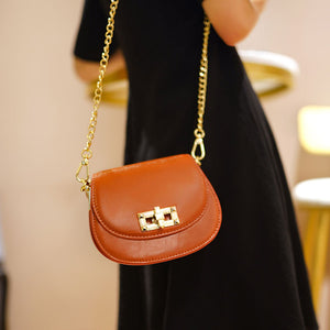 Leather half moon crossbody bag with golden chain