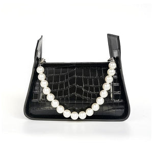 Black chanel pearl chain handbag