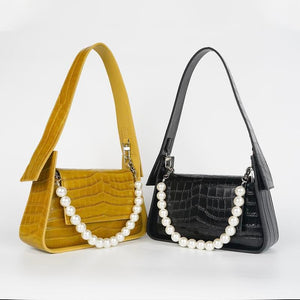 Yellow and black chanel pearl chain handbag